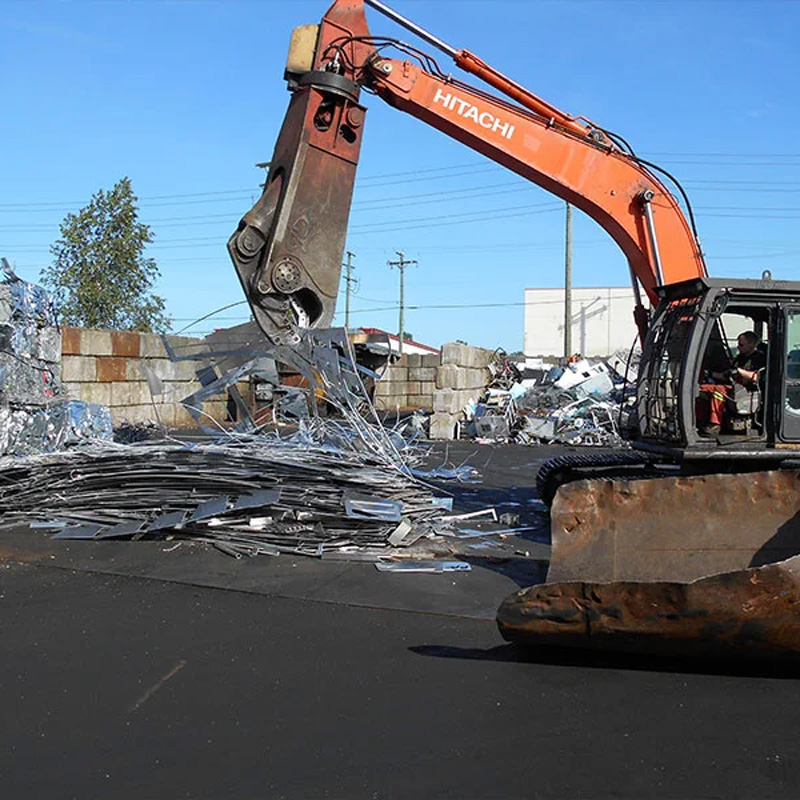 excavator moving metals